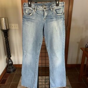 Silver Jeans light and distressed